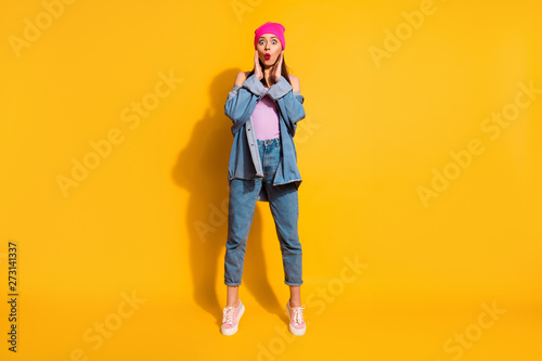 Full length body size view photo of attractive astonished impressed lady hear model incredible novelty sneakers isolated fashionable yellow bright background