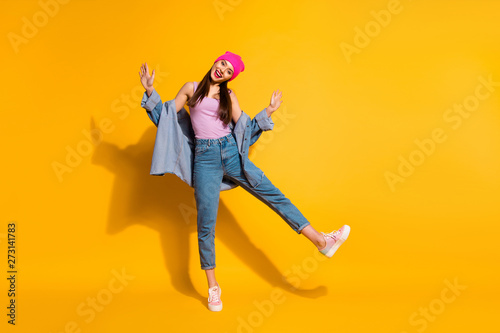 Full length body size view photo of nice pretty millennial hold hand have rest relax free time wear sneakers fashionable clothing isolated yellow background