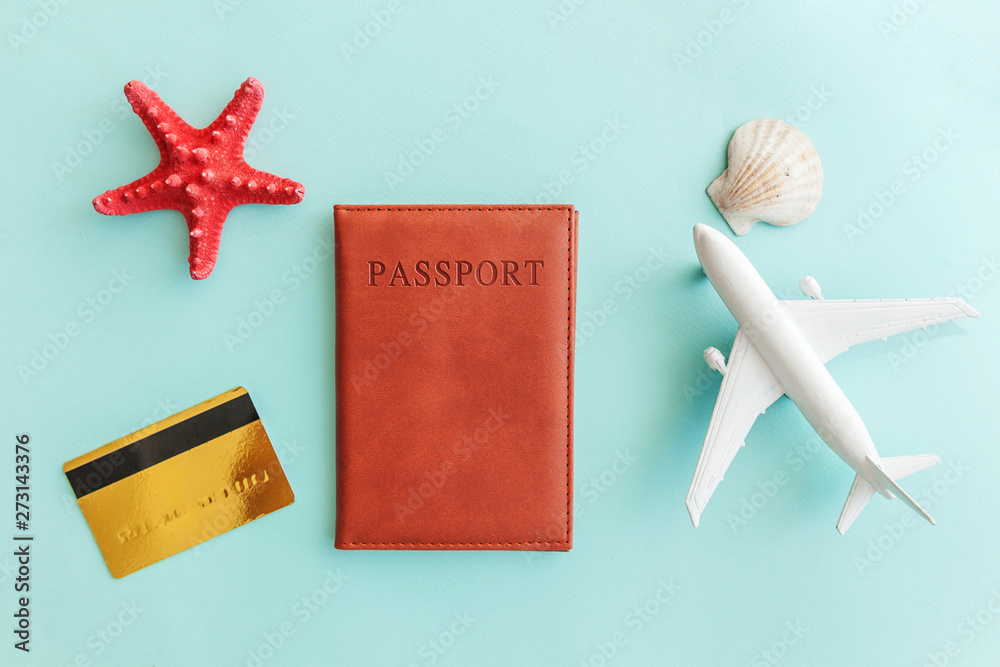 Vacation Travel Adventure Trip Concept Minimal Simple Flat Lay With Plane Passport Gold Credit Card And Shell On Blue Pastel Colourful Trendy Background Tourist Essentials Copy Space Stock 写真 Adobe Stock