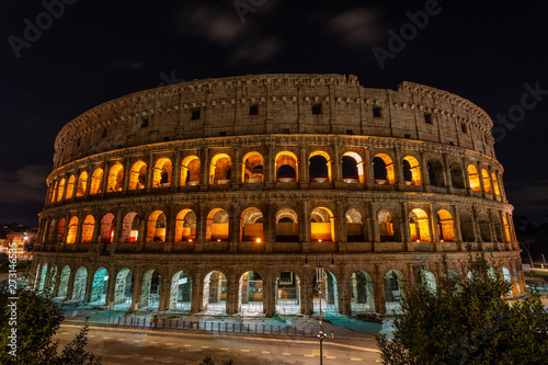 Italian monument to the Colosseum in the center of Rome in the illuminated night.
