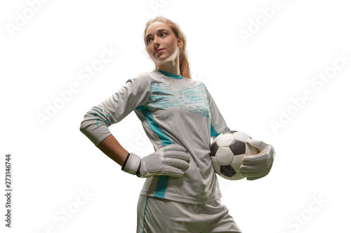 Isolated Female Soccer goalkeeper on white background. Girl with soccer ball photo