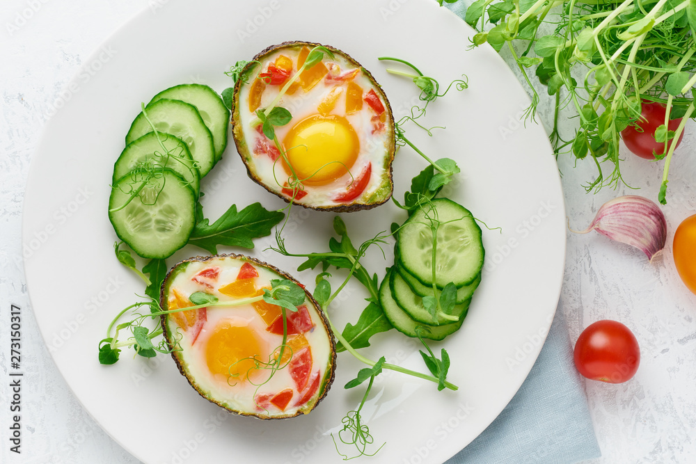 egg baked in avocado, toast, breakfast, top view egg baked in avocado, toast, breakfast, top view