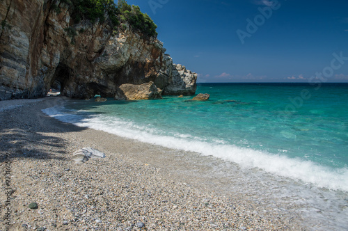 Fototapeta Naklejka Na Ścianę i Meble -  Milopotamos beach in Greece. Rocky cliffs and clear turquoise sea