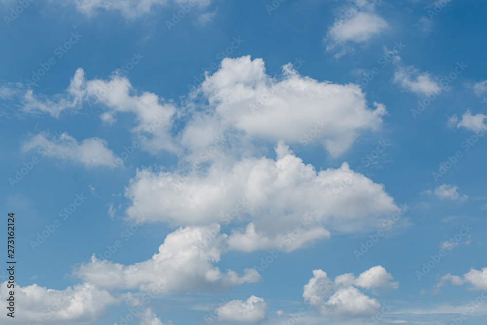 White clouds on blue sky ,nature background ,On a clear day White clouds on blue sky ,nature background ,On a clear day