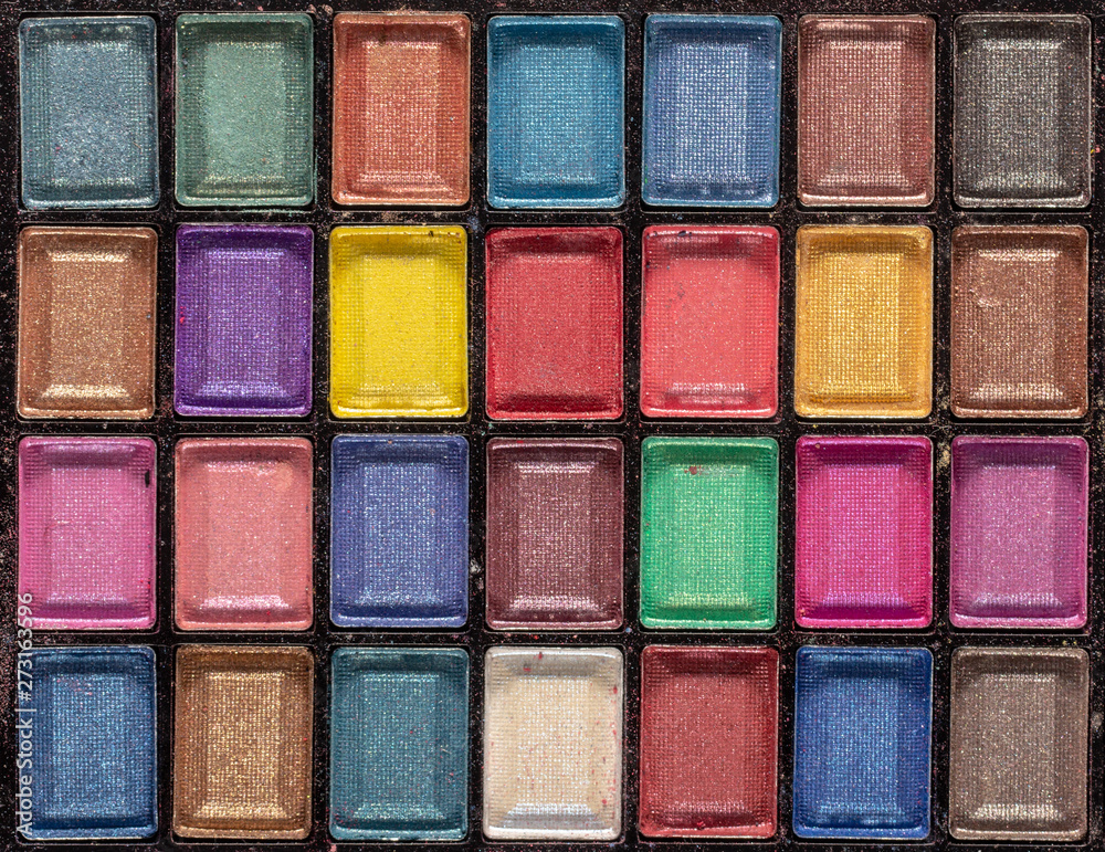 Fototapeta premium Colorful eye shadows palette. Makeup background. close up