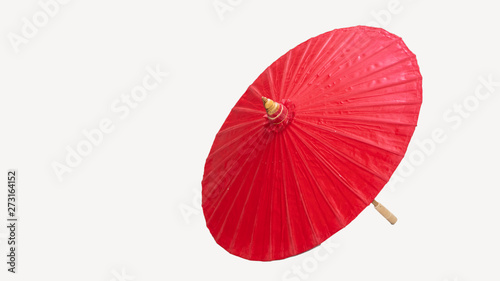 The red umbrella that cuts the background makes the background white.
