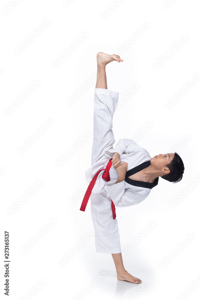 Master Red Belt Kid TaeKwonDo show basic step of fighting pose, Asian Teenager boy black hair tanned skin exercise warm up in white uniform bare foots, studio lighting white background copy space Master Red Belt Kid TaeKwonDo show basic step of fighting pose, Asian Teenager boy black hair tanned skin exercise warm up in white uniform bare foots, studio lighting white background copy space