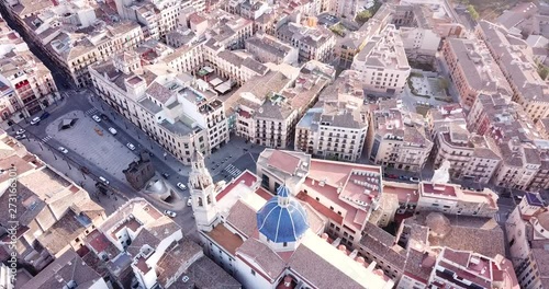 Aerial view of Alcoi cityscape with blue dome of Archpriest church of Santa Maria, Spain photo