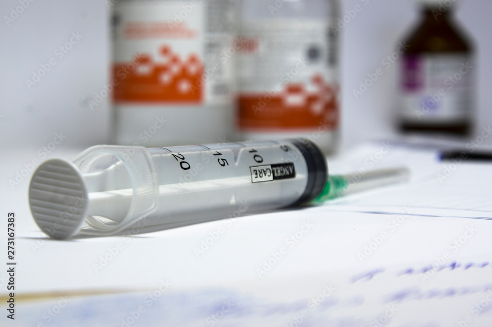  empty medical syringe on the background of  medication