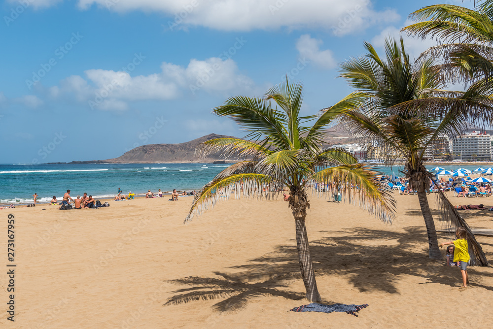 LAS PALMAS DE GRAN CANARIA, CANARY ISLANDS, SPAIN - OCTOBER 03, 2010: View of the beach Playa Las Canteras. LAS PALMAS DE GRAN CANARIA, CANARY ISLANDS, SPAIN - OCTOBER 03, 2010: View of the beach Playa Las Canteras.