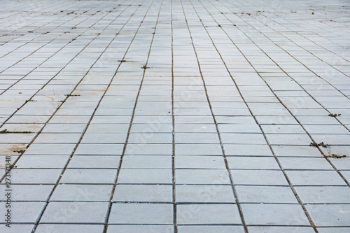 Cement blocks are paved on the ground