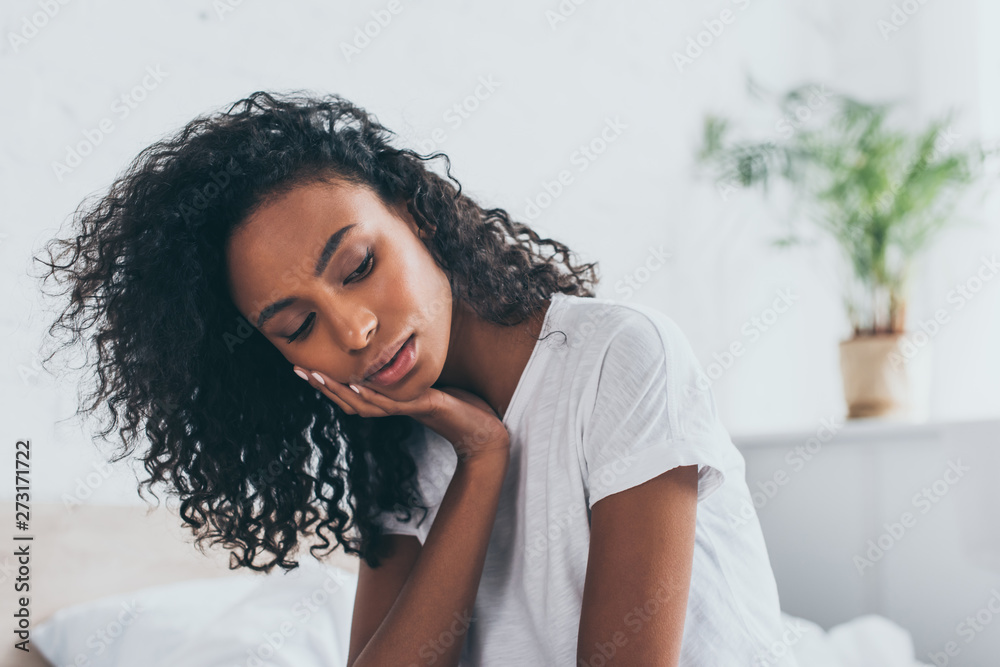 Εκτύπωση καμβά sad african american woman suffering from tooth pain in bedroom