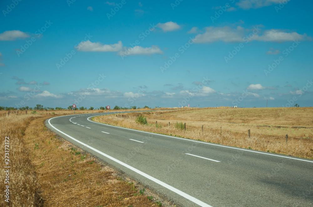 Road through rural landscape near the Monfrague National Park
