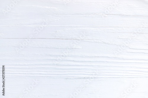White textured wood background. Empty wooden backdrop with rough surface. Blank wooden backdrop with grungy natural wood plank. Wooden table with a beautiful structure painted in white 