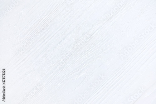 White textured wood background. Empty wooden backdrop with rough surface. Blank wooden backdrop with grungy natural wood plank. Wooden table with a beautiful structure painted in white 