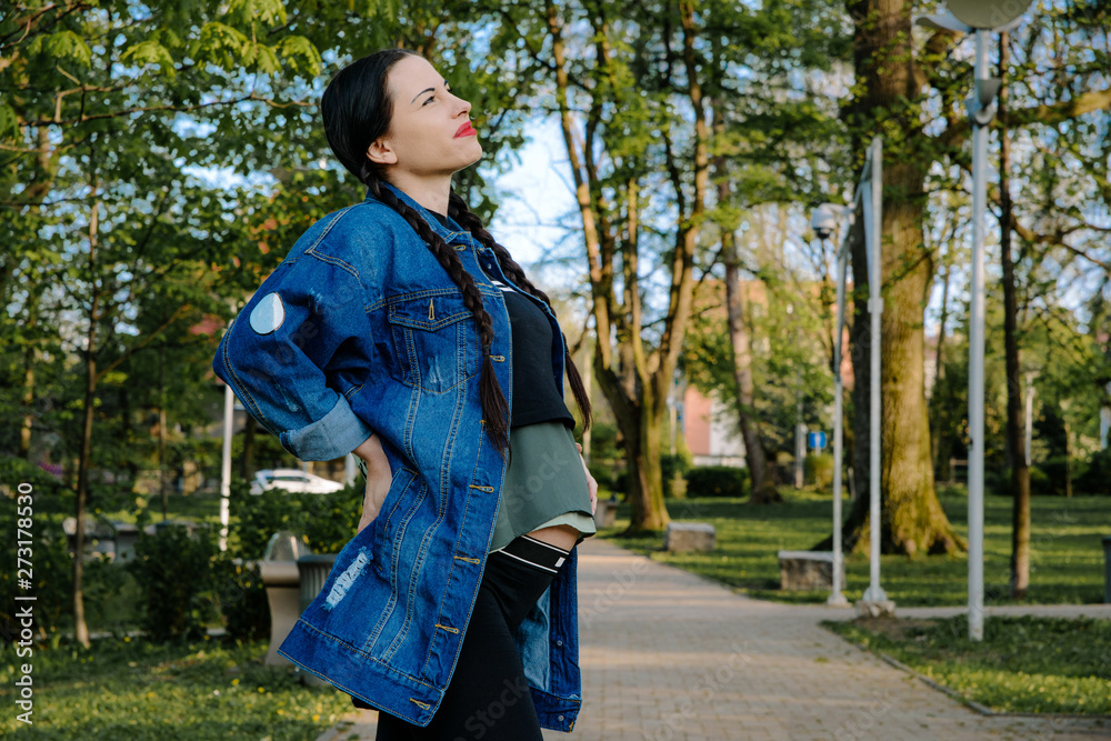 Spine pain in a pregnant woman. Medical and pharmaceutical concept. Pregnant woman suffers from pain, walking problem, weight sensation.