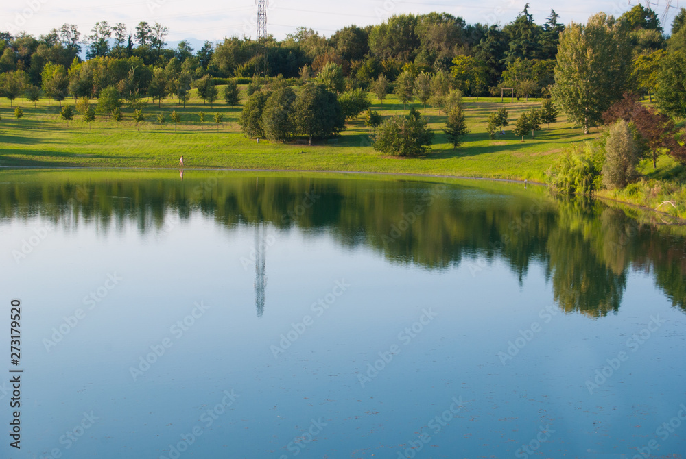 Nature reflected on the water of a small lake Nature reflected on the water of a small lake