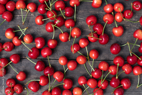 berries, cherry, red sweet cherry on a wooden table, summer