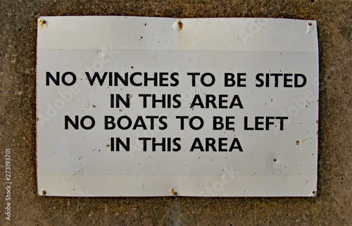 Sign at the slipway on Sidmouth sea front telling boat owners to keep the way clear