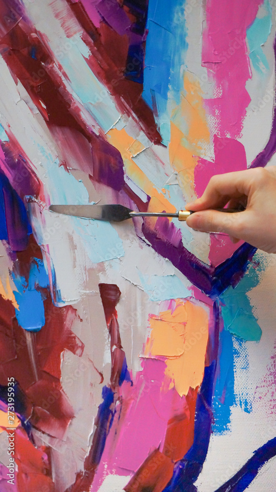 Fototapeta premium Oil horse portrait painting in multicolored tones. Conceptual abstract painting of a horse head. Closeup of a painting by oil and palette knife on canvas.