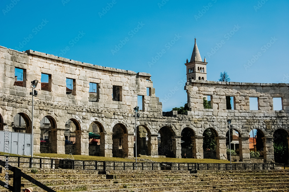 Pula, Croatia - June 10, 2019: Roman amphitheater in Pula, the best preserved ancient monument in Croatia, visited by hundreds of tourists.