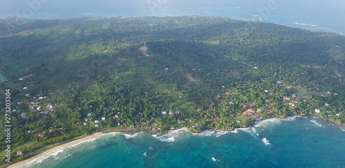 Green island in blue ocean ...