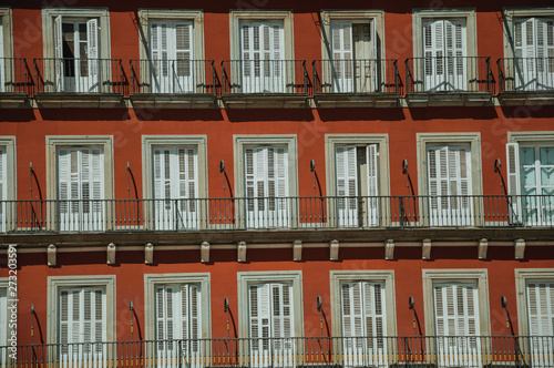 Building with colorful facade and windows on the Plaza Mayor in Madrid