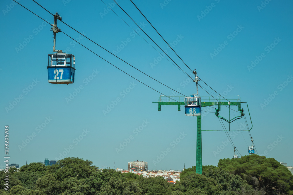 Cable car gondola and big supporting towers at the Teleferico Park of Madrid