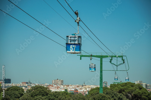 Cable car gondola and big supporting towers at the Teleferico Park of Madrid