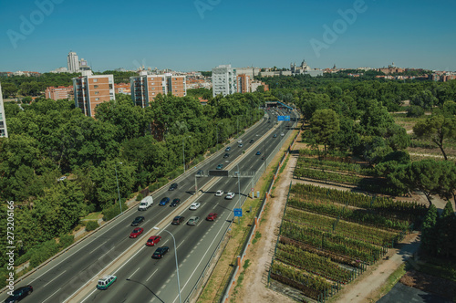 Highway with heavy traffic and trees in Madrid