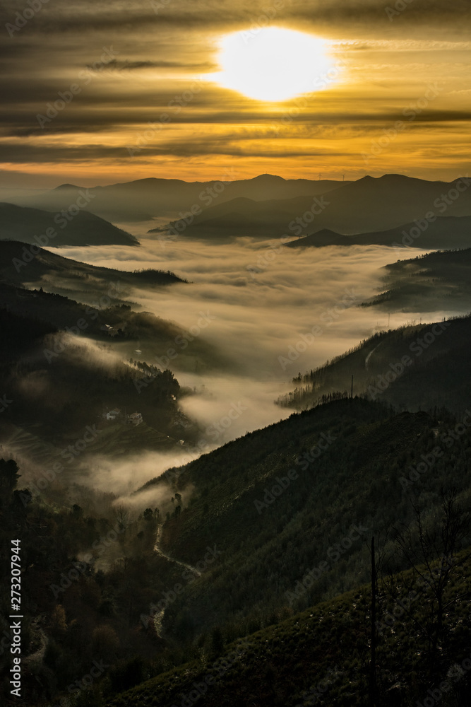 sunset in the mountains with fog sunset in the mountains with fog
