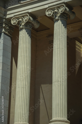 Columns with Ionic capitals on the facade of building in Madrid