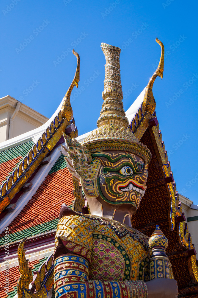 Fototapeta premium Demon Guardian at the Wat Phra Kaew - the Temple of the Emerald Buddha is a Buddhist temple in the historic centre of Bangkok, Thailand, within the grounds of the Grand Palace.