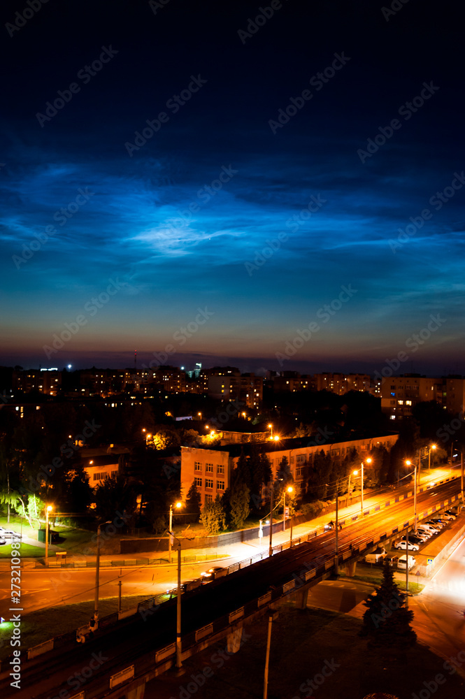 The night sky is shining above the city