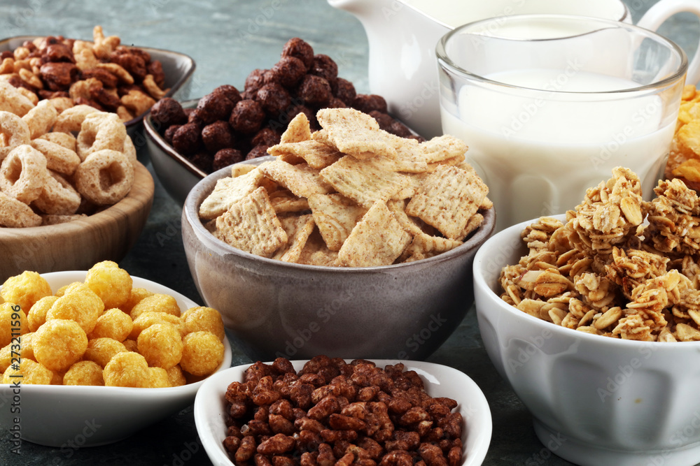 Cereal. Bowls of various cereals and milk for breakfast. Muesli with kids cereals. Cereal. Bowls of various cereals and milk for breakfast. Muesli with kids cereals.