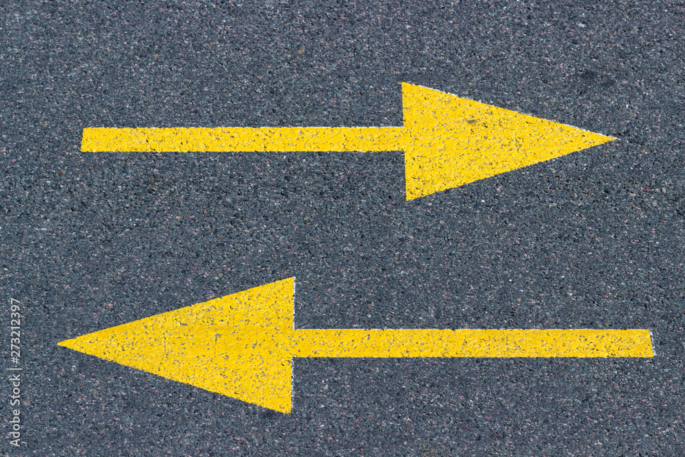 asphalt arrows, direction indicator, concept of choice or entanglement