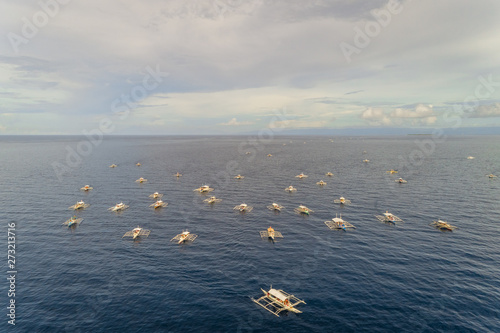 Aerial view of white traditional filipino boats near Panglao, Philippines.