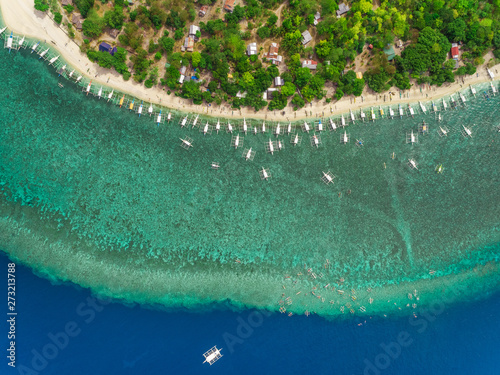 Aerial view of boats moored at beach, Balicasag Island, Philippines photo