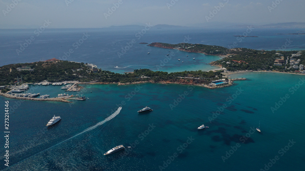 Obraz premium Aerial view of iconic emerald sandy celebrity beach of Asteras or Astir, Vouliagmeni, Athens riviera, Attica, Greece
