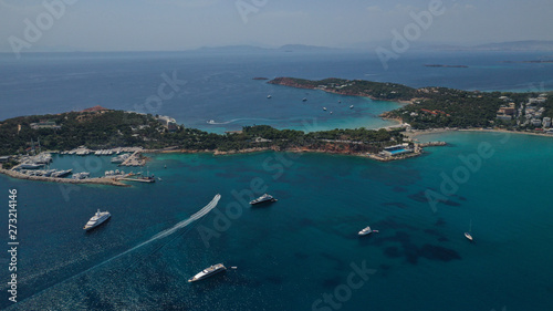 Aerial view of iconic emerald sandy celebrity beach of Asteras or Astir, Vouliagmeni, Athens riviera, Attica, Greece