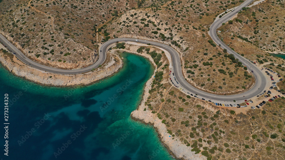 Aerial view photo of road in Athens riviera seaside known limanakia forming small bays with turquoise clear sea, Vouliagmeni, Attica, Greece