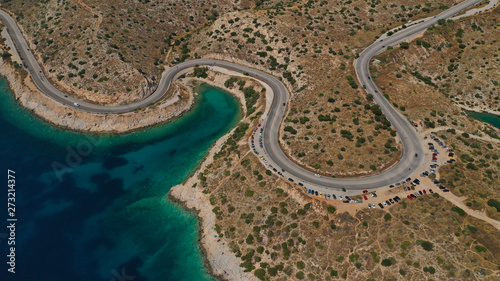 Aerial view photo of road in Athens riviera seaside known limanakia forming small bays with turquoise clear sea, Vouliagmeni, Attica, Greece © aerial-drone