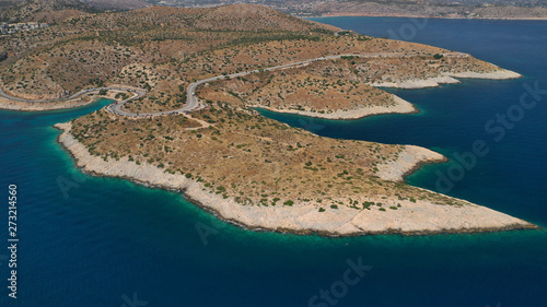 Fototapeta Naklejka Na Ścianę i Meble -  Aerial view photo of road in Athens riviera seaside known limanakia forming small bays with turquoise clear sea, Vouliagmeni, Attica, Greece
