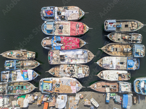 Aerial view of The Dubai Dhow Wharfage harbour in United Arab Emirates. photo