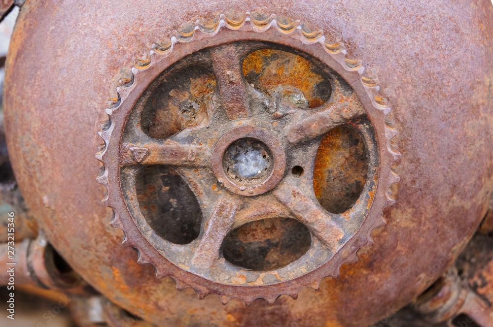 rusty gear closeup, rusty ancient mechanism rusty gear closeup, rusty ancient mechanism