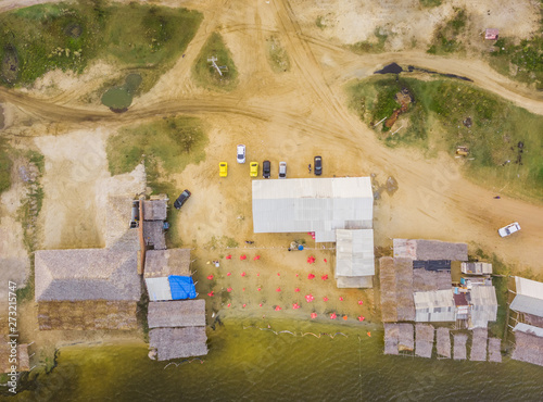 Aerial view of small cabins in Caiupe Lagoon area in Brazil. photo