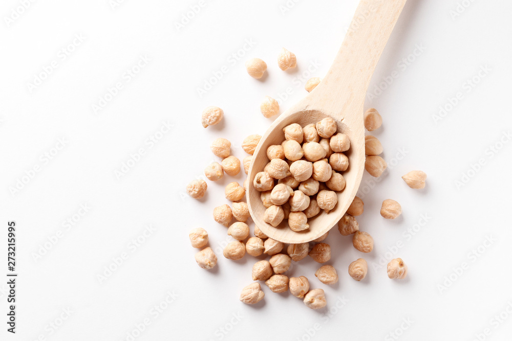 Chickpea in a wooden spoon isolated on white background Chickpea in a wooden spoon isolated on white background