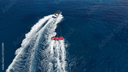 Aerial photo of extreme powerboat donut watersports crusing in high speed in tropical turquoise bay © aerial-drone