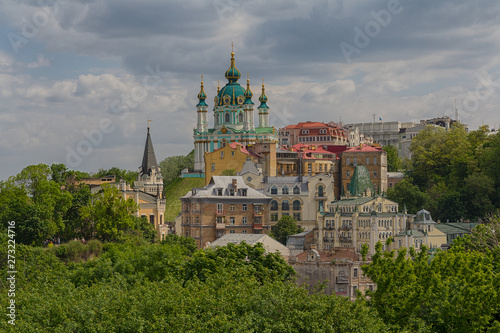 Beautiful view of the ancient street Andrew's Descent and the St. Andrew's Church. Kiev, Ukraine