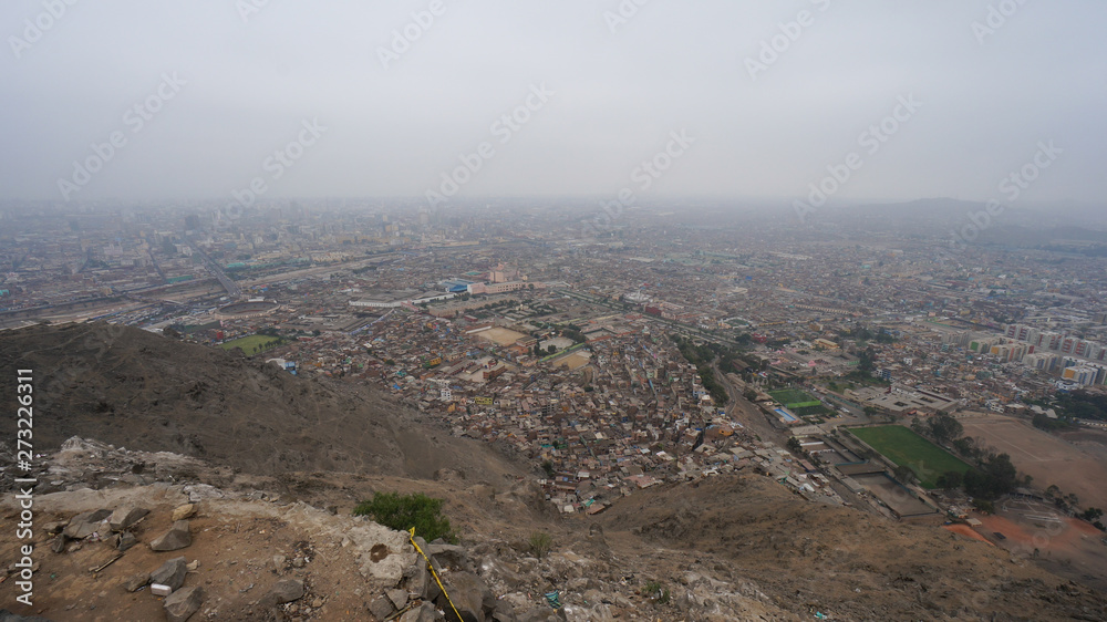 Aerial panoramic view of the poor districts of Lima in Peru.